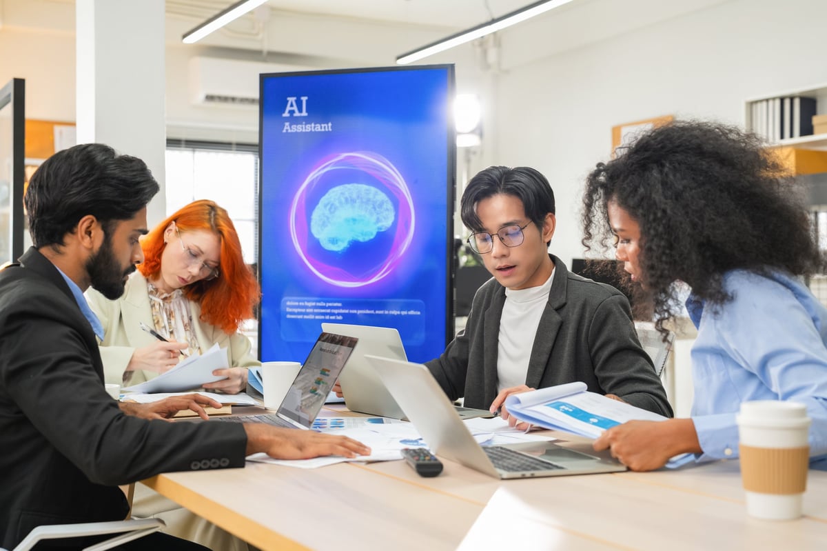 Business professional using AI-powered virtual assistant and analytics on a laptop